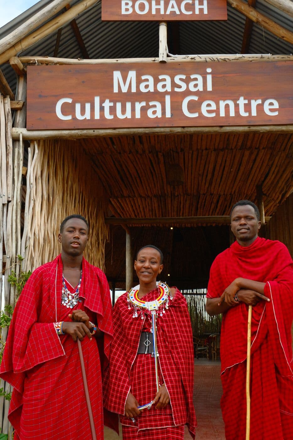 Three Maasai hosts outside the Maasai Cultural Centre at Makuyuni.