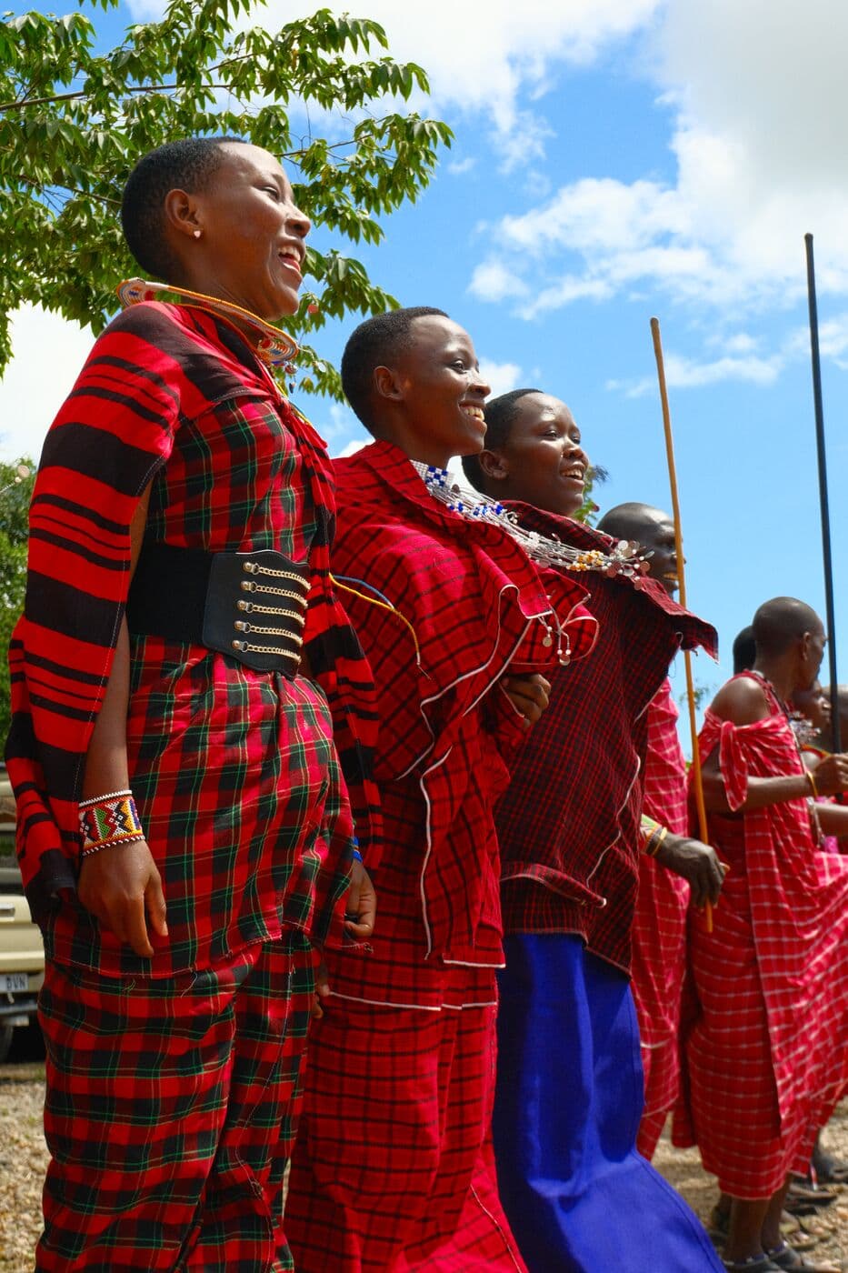 Maasai warriors standing on the grasslands they help protect.