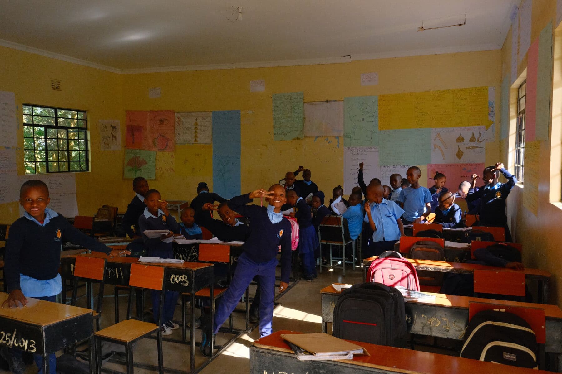 Children at their desks in the Nashipay Maasai School classroom.