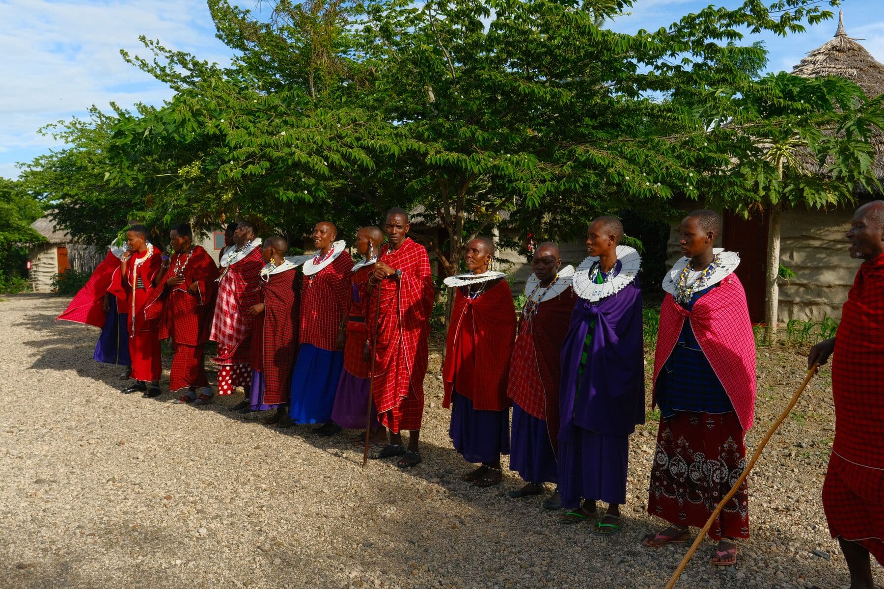 Maasai women walking together along the village path at Makuyuni.